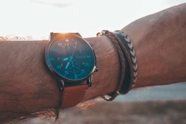 how to wear a watch with bracelets